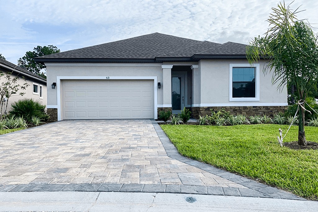 A Florida family in front of a home